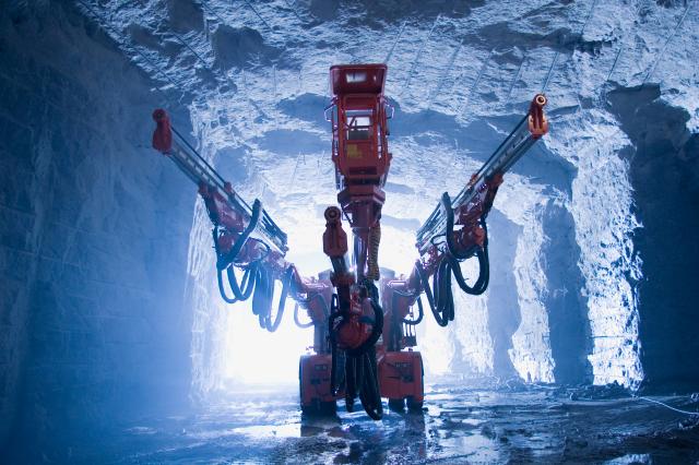 Drills are used in underground and surface mines to prepare the rock face for blasting