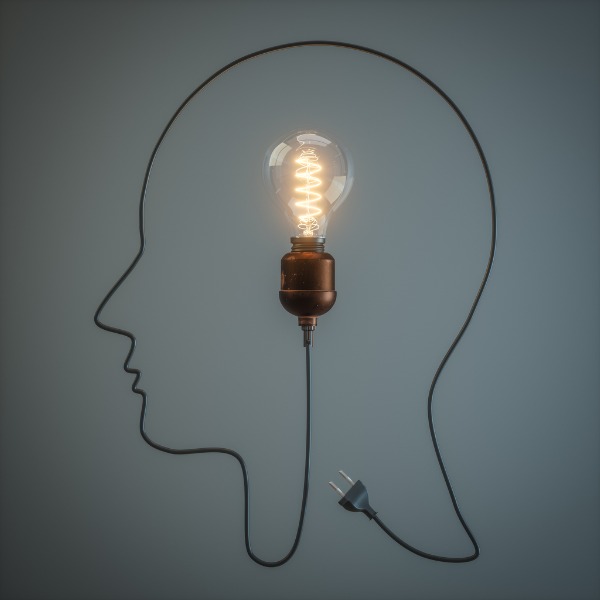 Ampoule et cordon électriques disposés de façon à former une tête