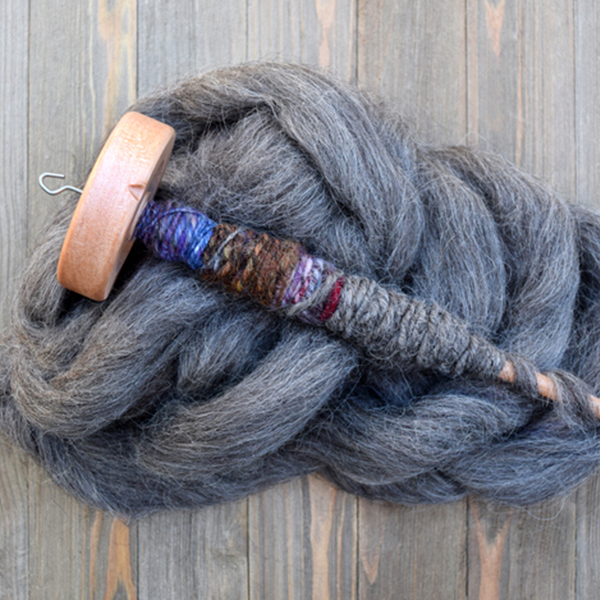 Drop spindle with wool 