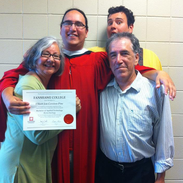 Elliott with family at Fanshawe graduation.
