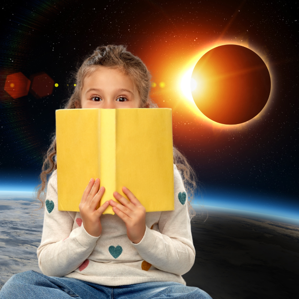 Enfant lisant devant l'éclipse solaire