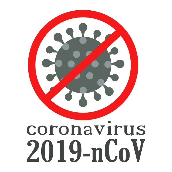 Cartoon coronavirus overlayed with a “no” symbol